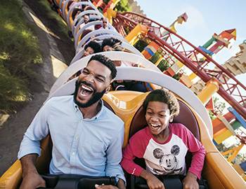 Family on Disney slinky ride 